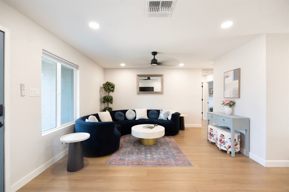 Stylish living room with plush seating and curated design—perfect for relaxing after a day in the Arizona desert
