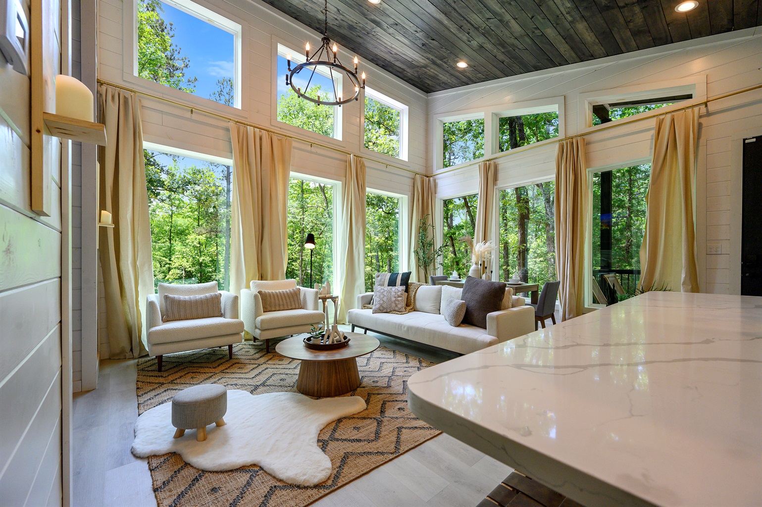 Sunlit spaces with peaceful nature views, stylish seating, and a warm, welcoming vibe are waiting for you at this beautiful retreat. Come stay with us!