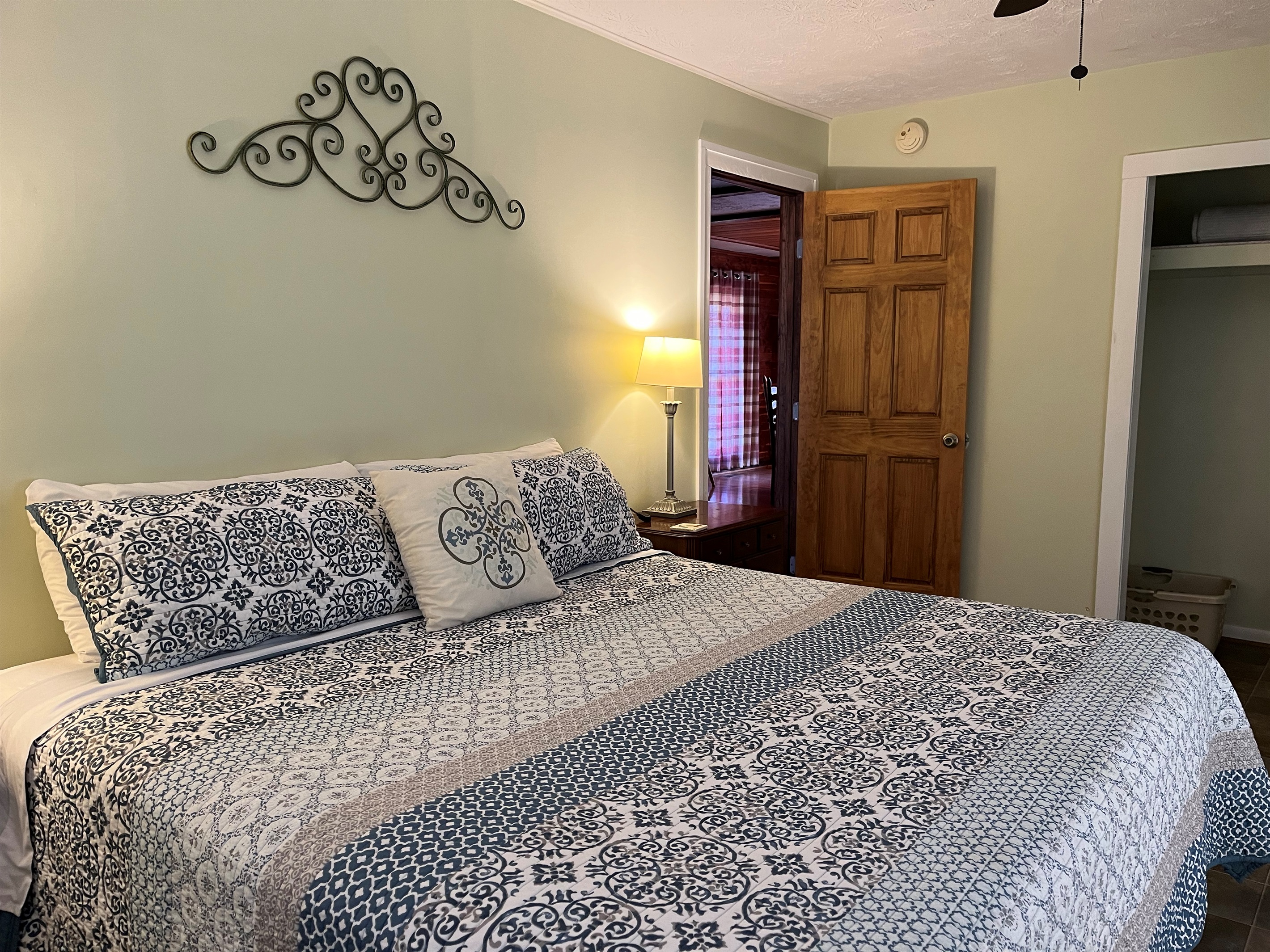 Master bedroom with a king bed.