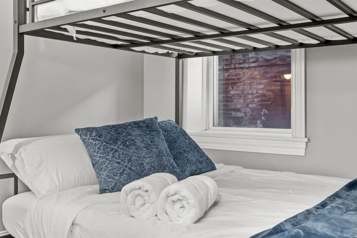 Queen size on bottom, Full XL on top! No one has to feel cramped. (Use caution when climbing the ladder!)