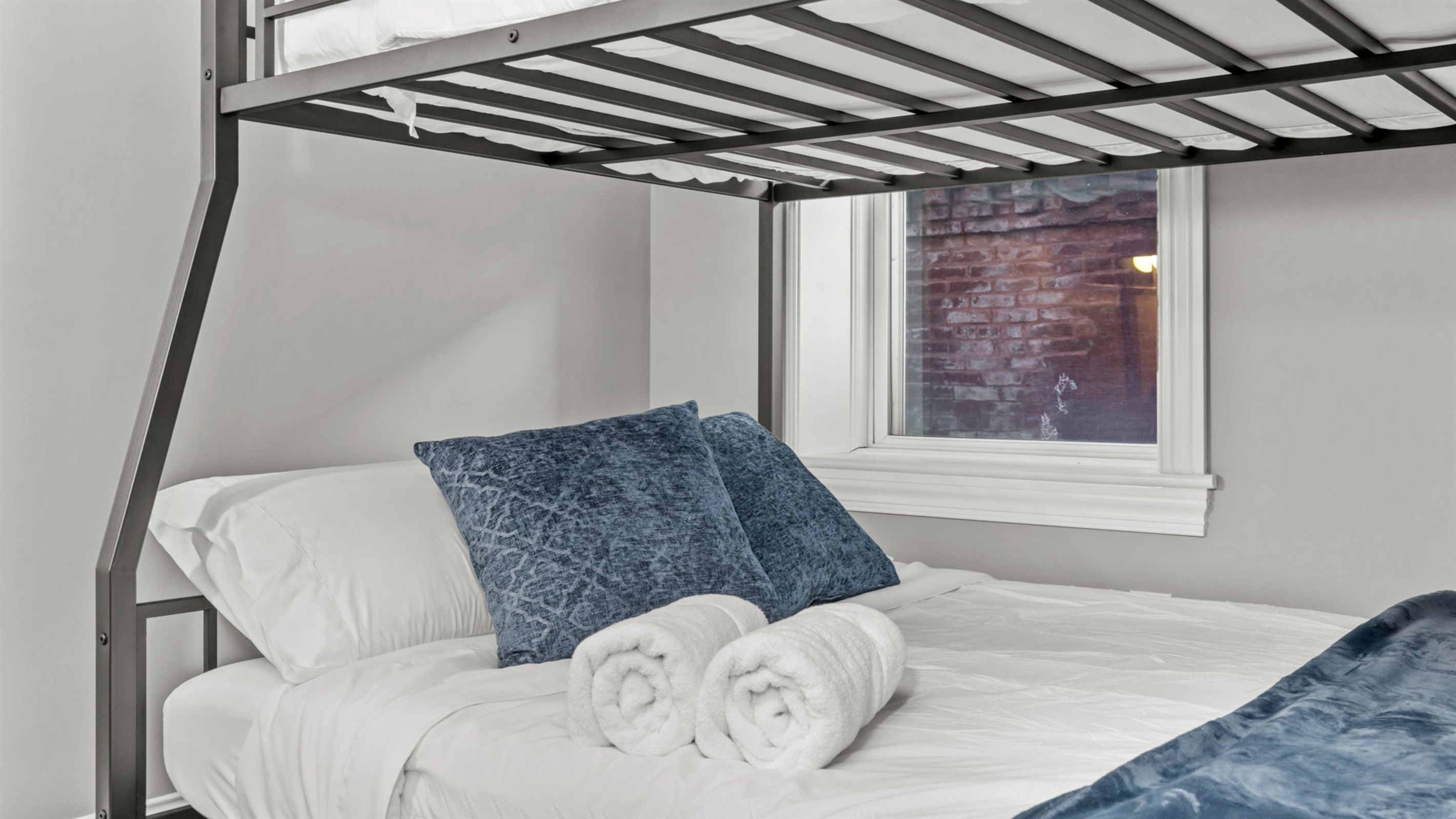 Queen size on bottom, Full XL on top! No one has to feel cramped. (Use caution when climbing the ladder!)