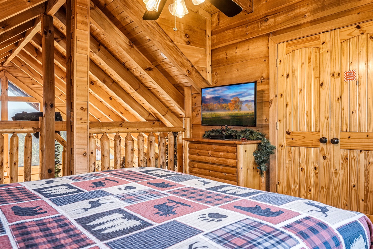 Loft area queen size bedroom with attached full size bathroom