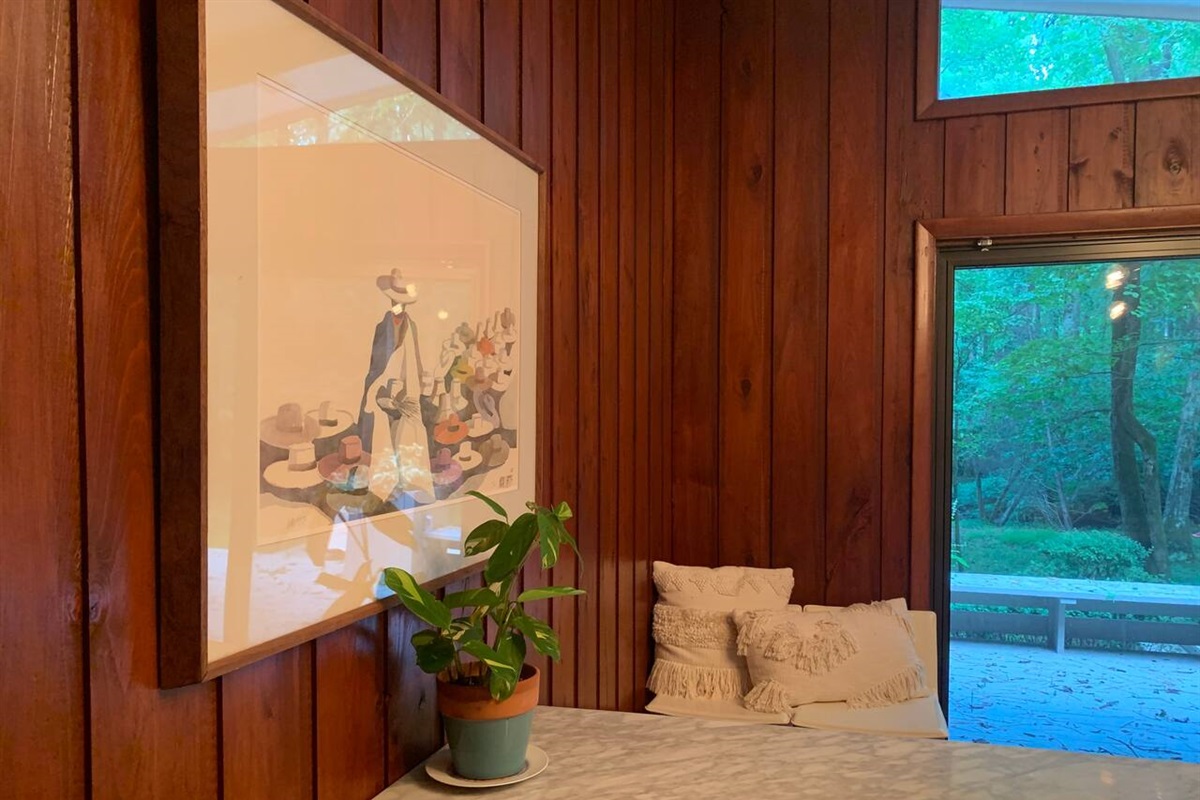 Each room features original, signed art. In the dining room, you'll find a signed lithograph from Noal Betts, a Californian artist known for his watercolor landscapes and tapestry designs.