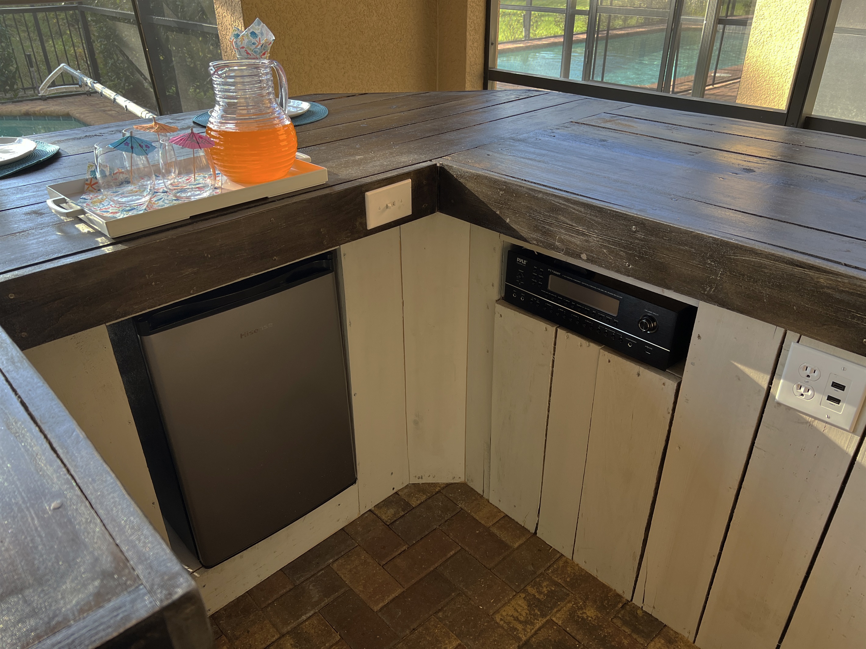 Drink Refrigerator And Amplifier For Poolside Theater Surround Sound