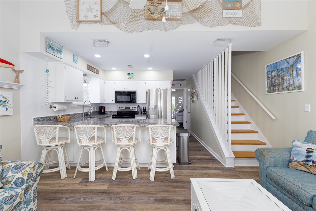A delightful blend of coastal style and modern functionality in the kitchen area