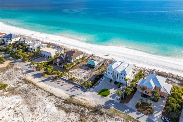 Golf cart and vehicle parking at your private beach access point.