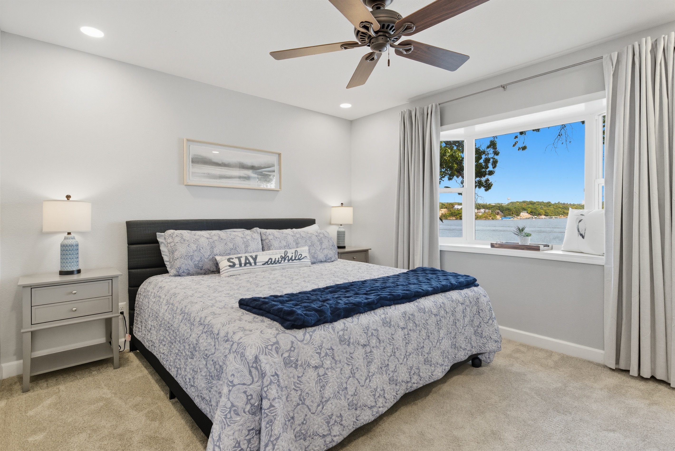 Wake up to beautiful lake views from the king bedroom