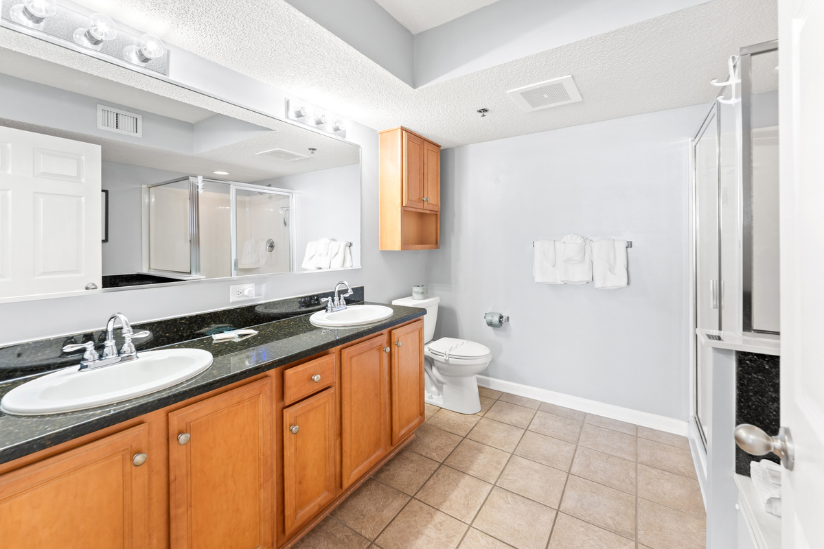 Main bathroom with double sinks, jetted tub and stand alone shower