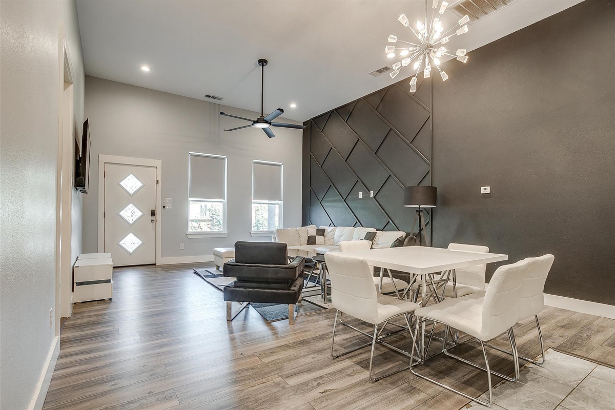 Dining area with statement lighting and plenty of space to entertain.