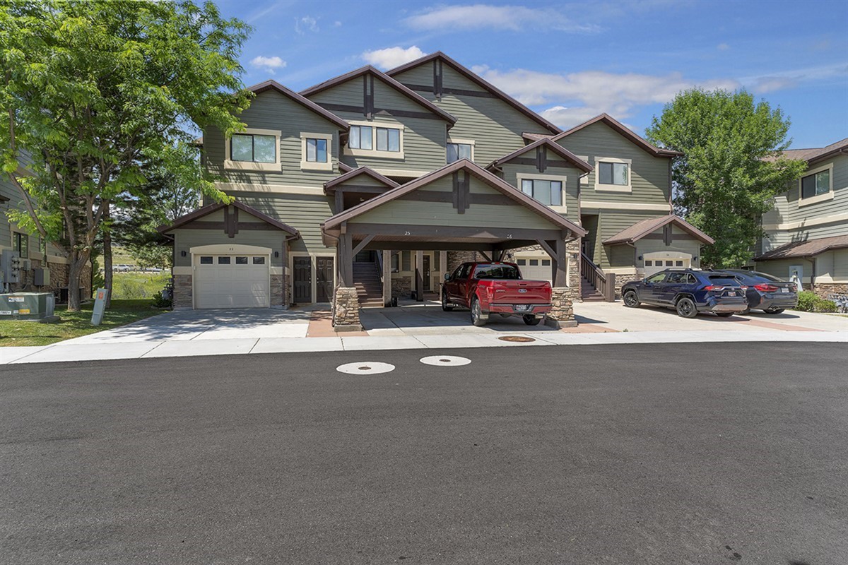 This stunning Lakeside Village townhome showcases timeless mountain architecture, offering both privacy and upscale curb appeal in a serene setting.