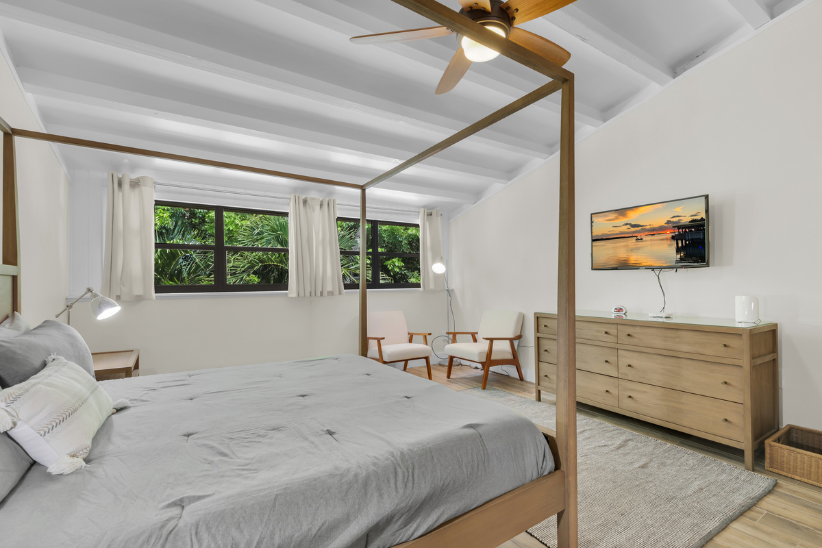 Large primary bedroom with king bed