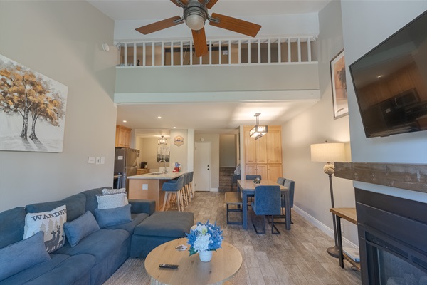 The guardrails on the second floor are connected to the kids' loft area.