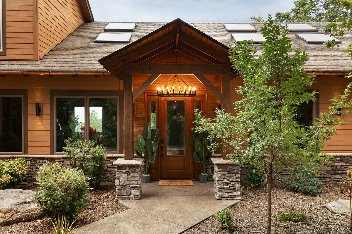 {Front Entry} Welcome to Canopy Club—your private mountain retreat tucked into the forest with lodge-style timber details from the moment you arrive.