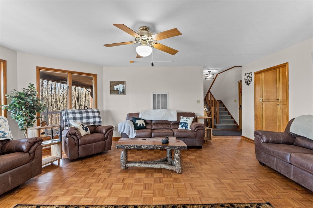 Living Room: Bright space with comfortable seating, perfect for relaxation after outdoor adventures!