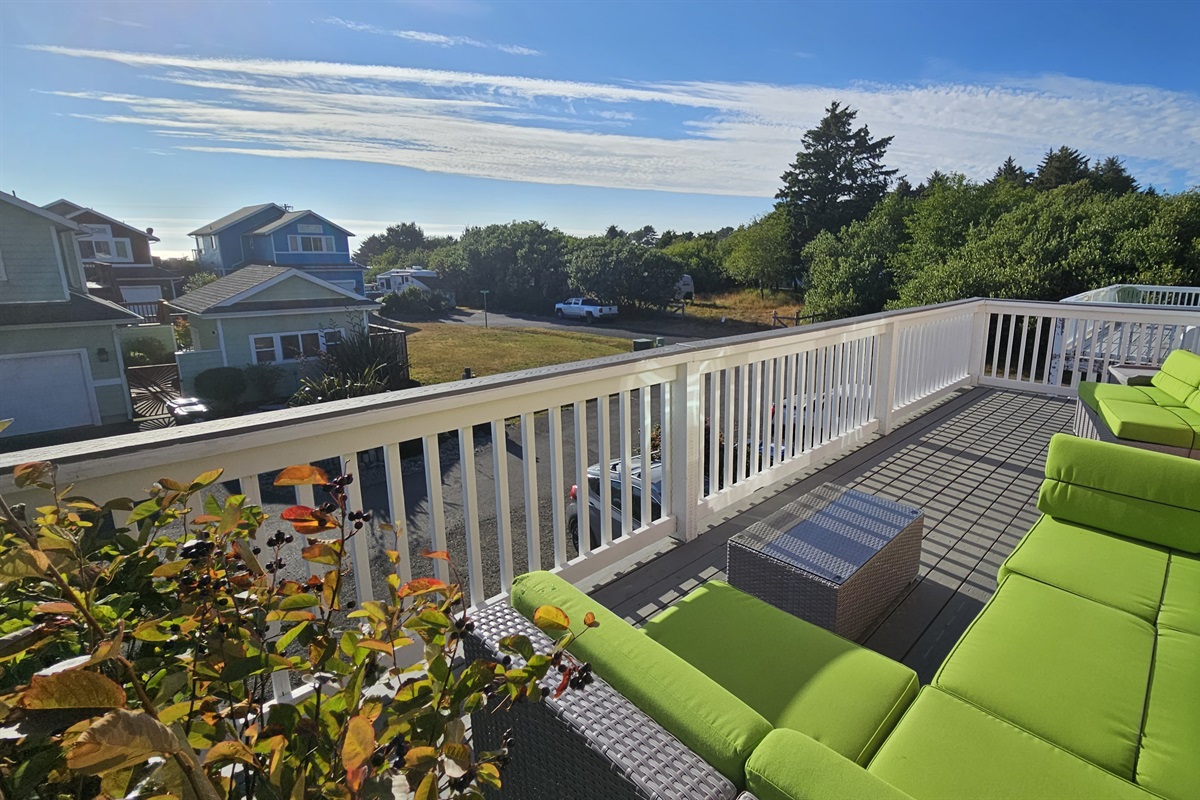 Sunbathe on the upper deck as the ocean roars below the bluff