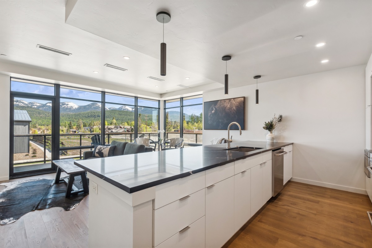 Relish the floor to ceiling views while whipping up a meal