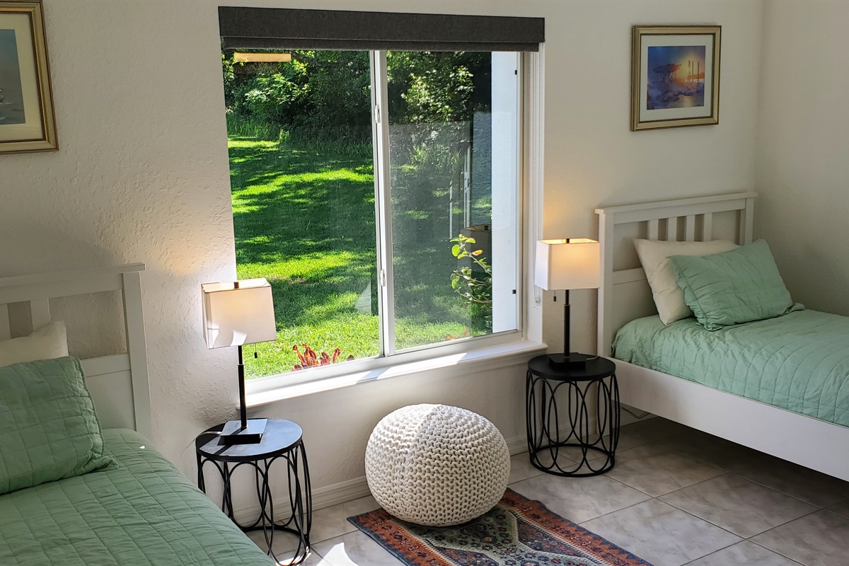 Twin bedroom with front yard view