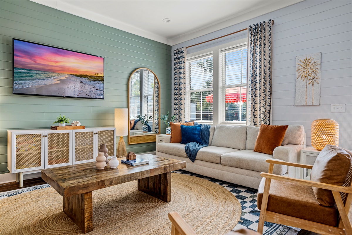Sunlight, cozy seating, and coastal style. Kick back, watch a movie, or simply unwind after a full beach day in Destin.