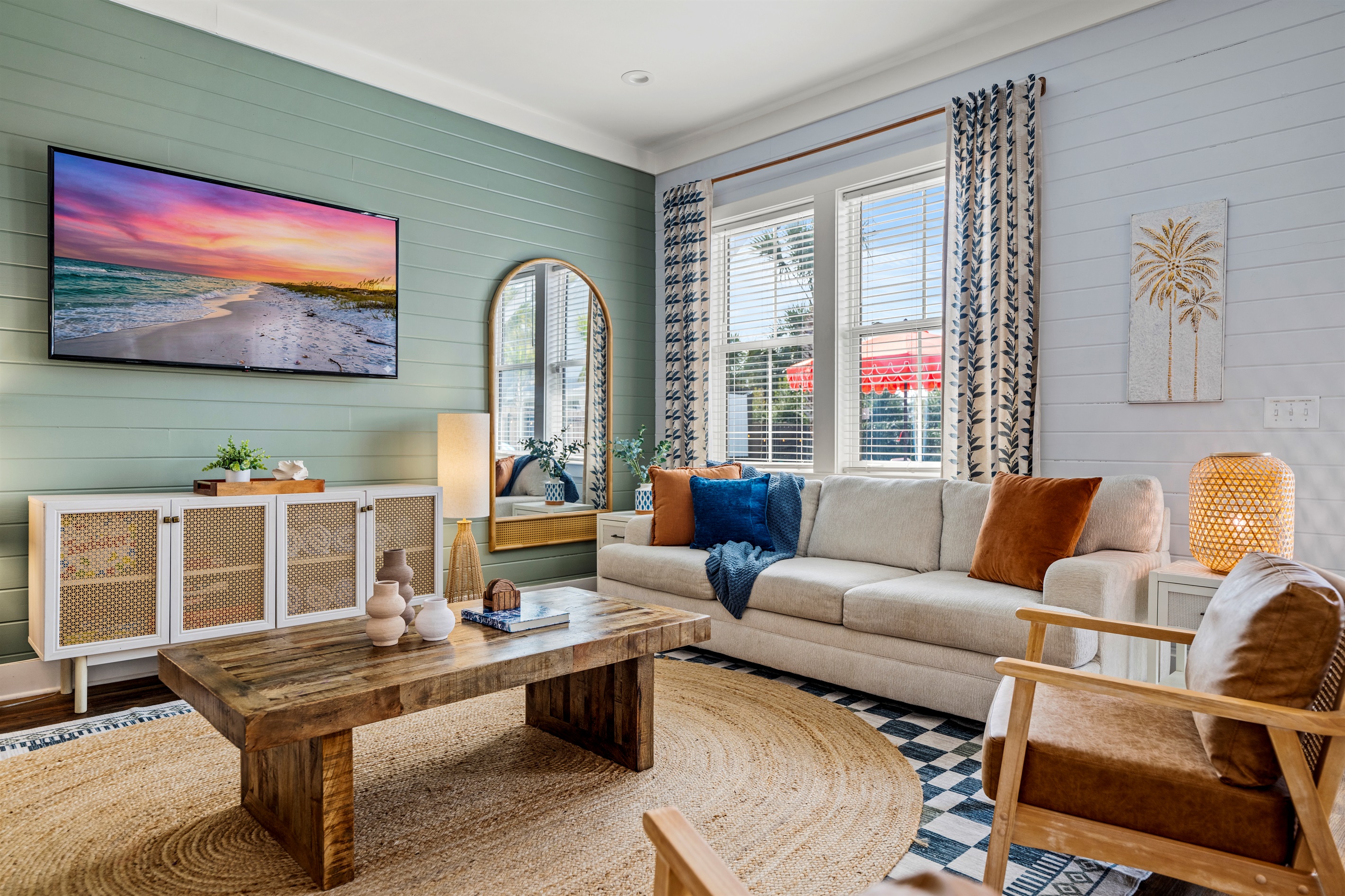 Sunlight, cozy seating, and coastal style. Kick back, watch a movie, or simply unwind after a full beach day in Destin.