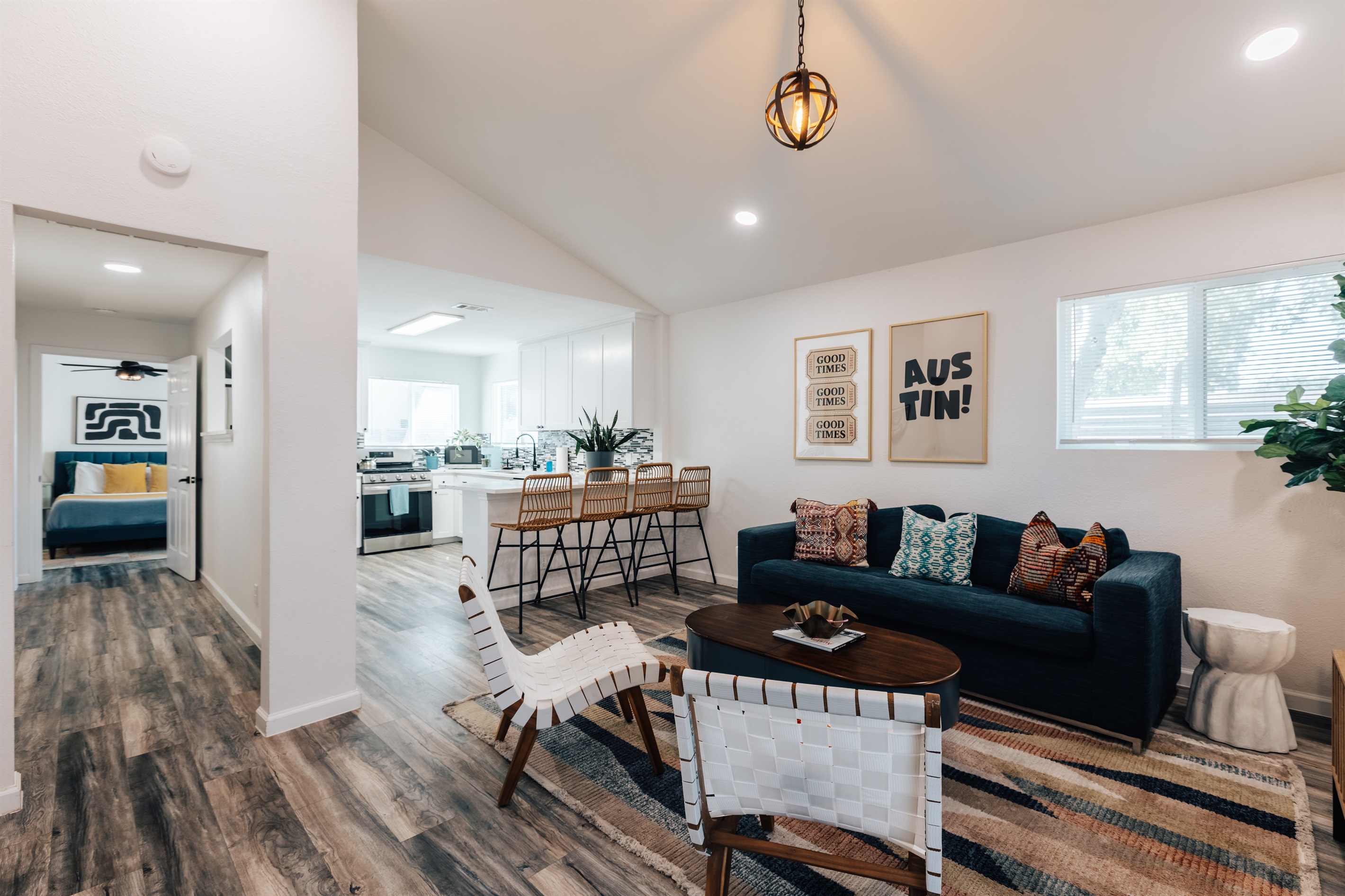 big hall way connected to the living room , leads to master bedroom