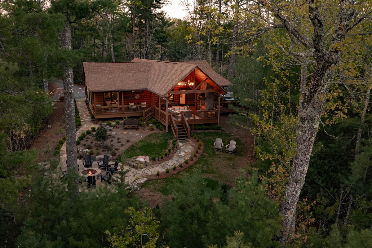 Unwind in this cozy log cabin surrounded by nature. Enjoy evenings by the firepit, mornings on the wraparound porch, and the perfect balance of rustic charm and modern comfort.