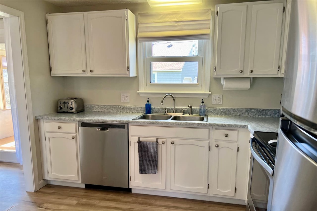 Kitchen including dishwasher and freezer