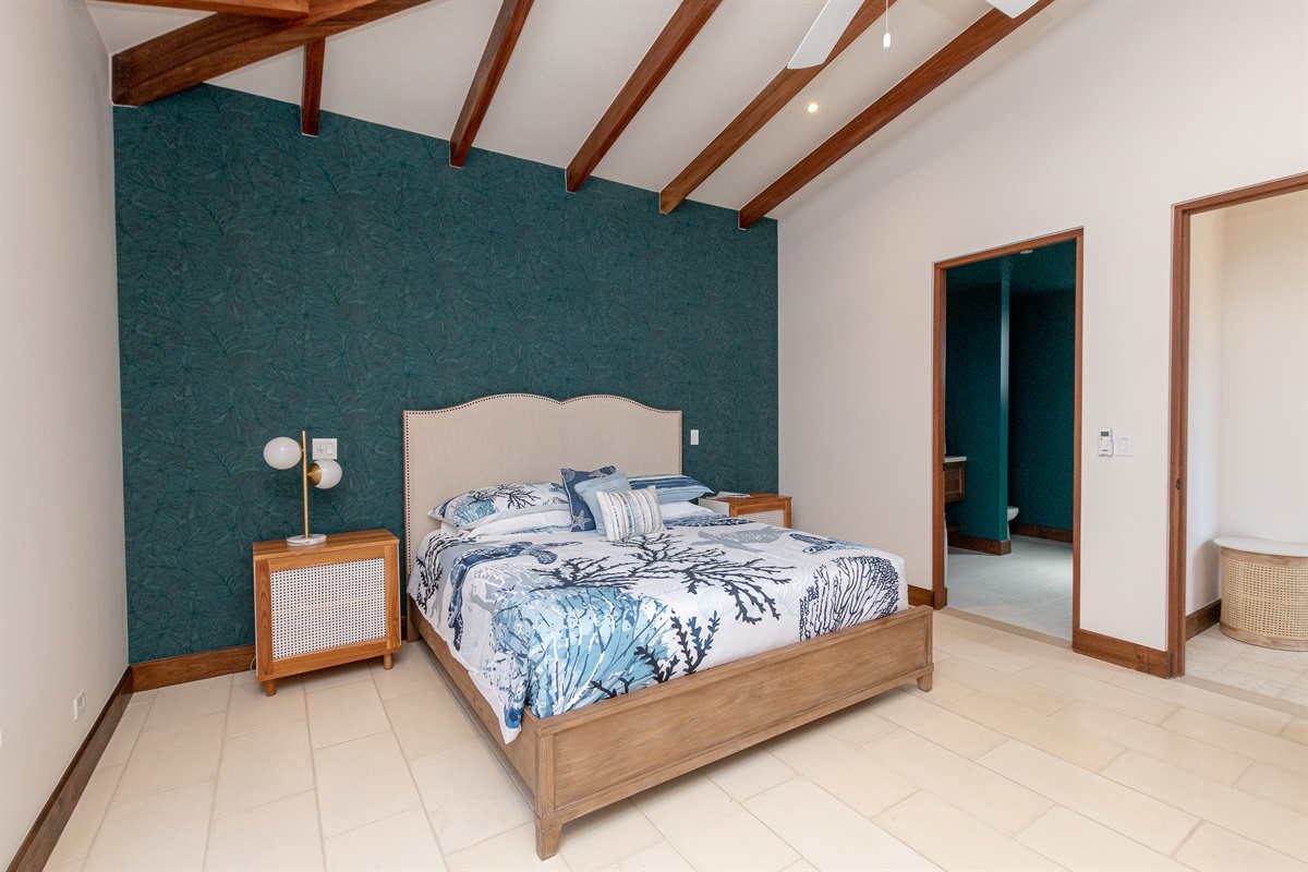 Primary king suite located in the left wing of the home. Offers the most privacy and an office space perfect for remote work.