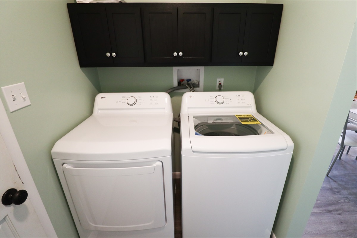 Full size washer and dryer with detergent available.