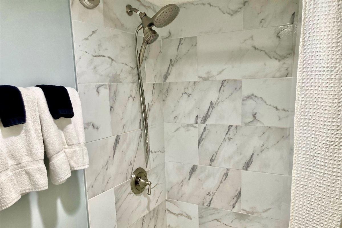 New tub, new tile and new shower heads in the master bath!