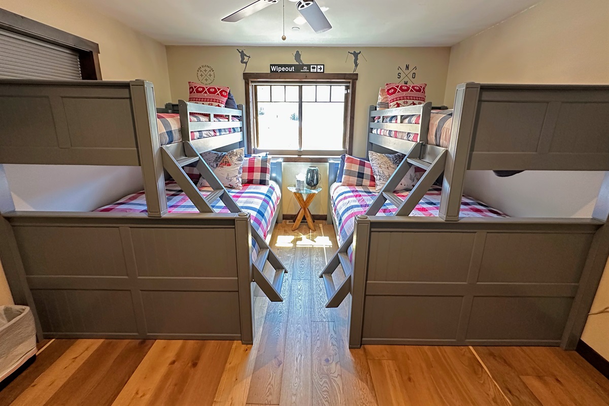 Rest easy in the bunkroom’s two queen beds and two XL twin beds—perfect for kids or adults who need plenty of space to stretch out.