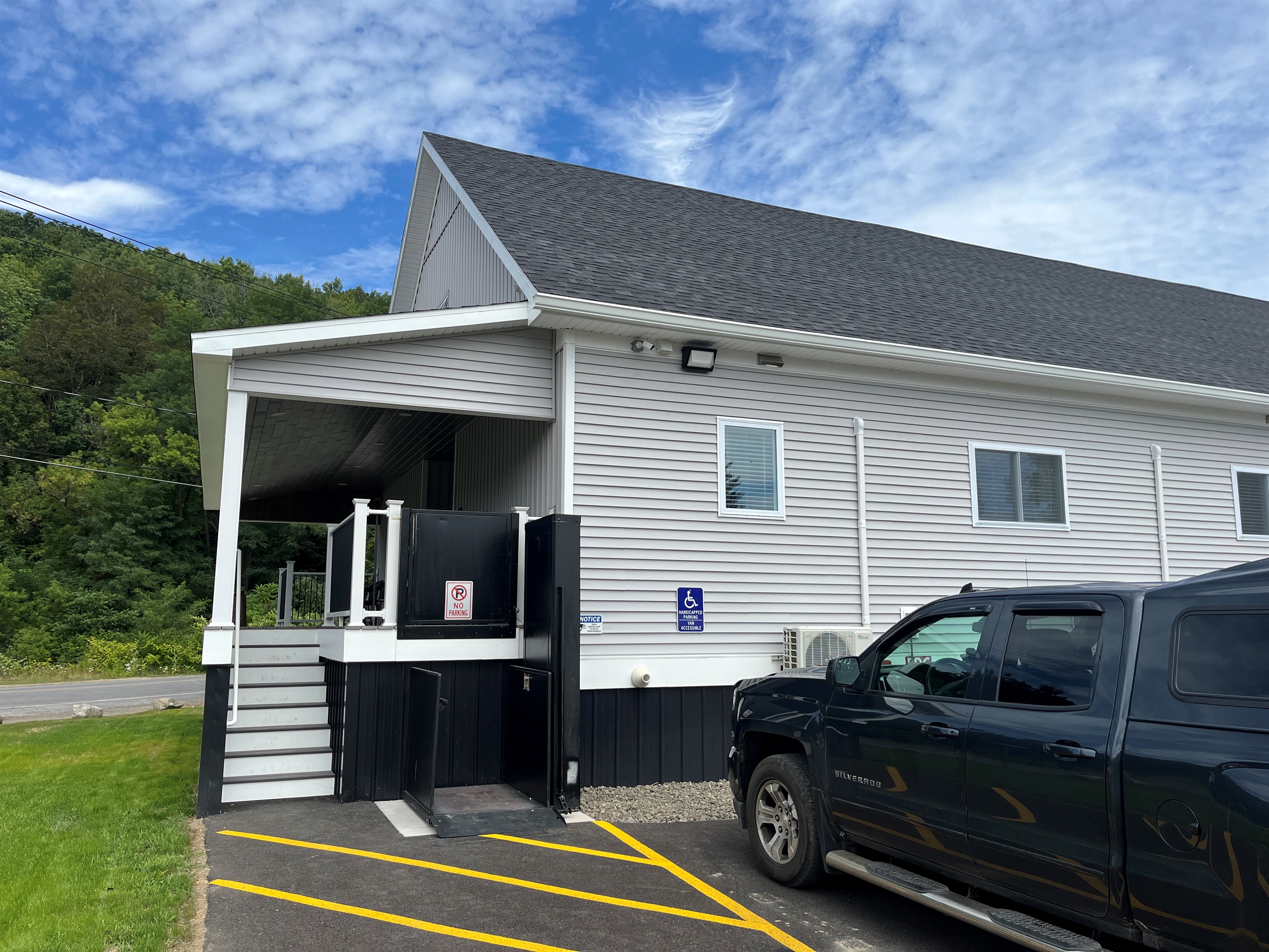 Dedicated Handicap Parking space and power lift