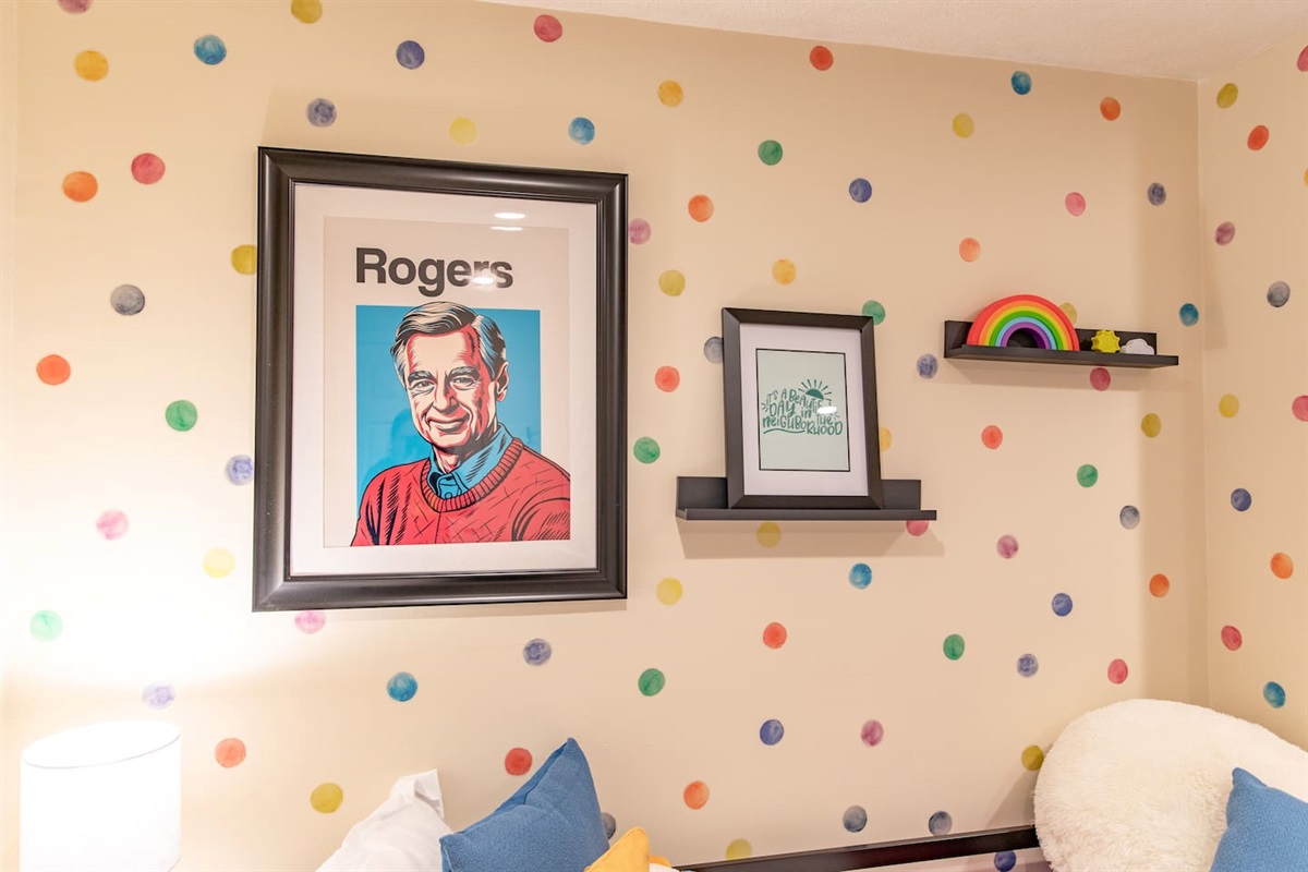 A collection of stylish hanging wall frames, showcasing a mix of artwork and photographs that add personality and visual interest to the space.