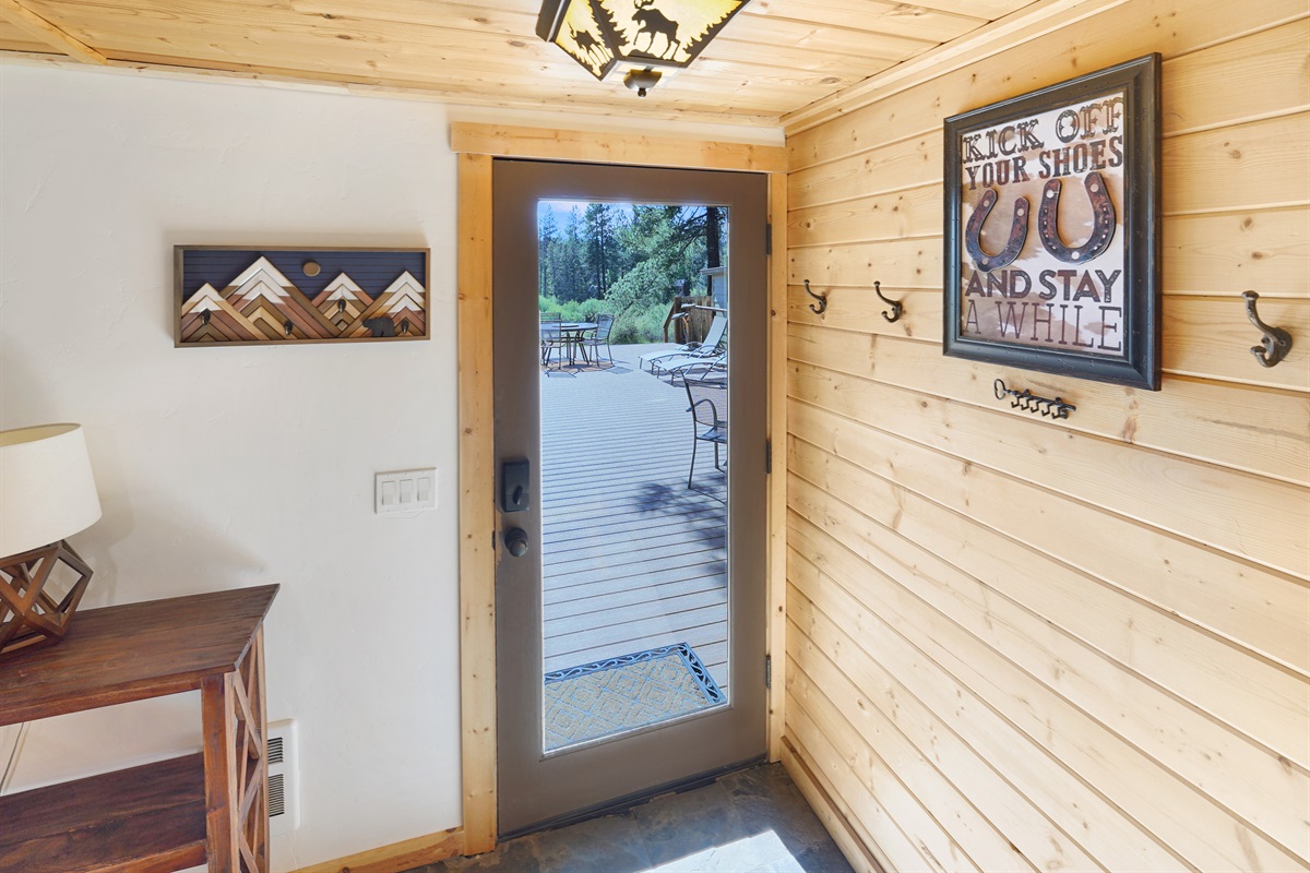 Welcoming front entry with covered outdoor access