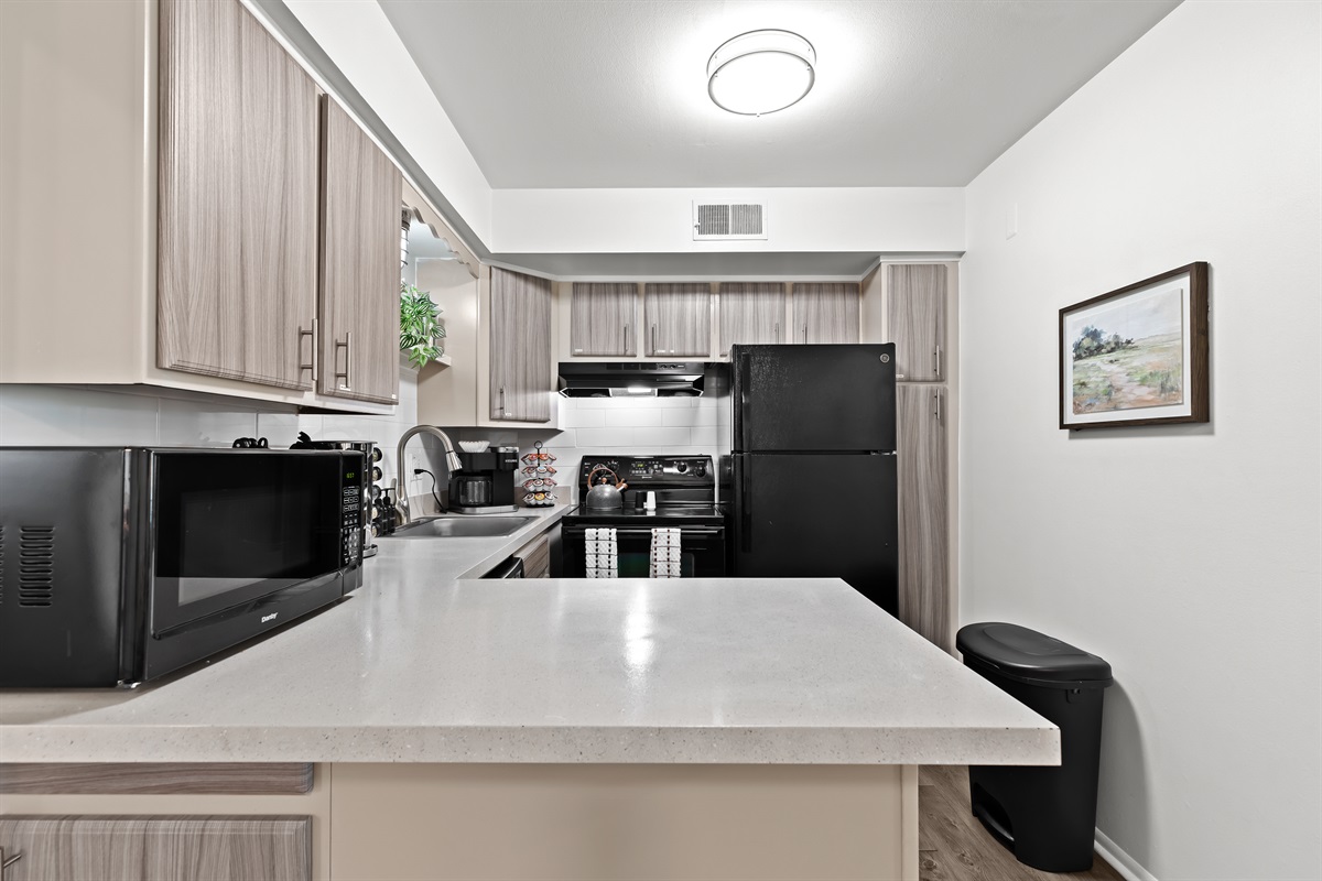 Fully equipped for convenience—enjoy a full knife set, spices, and cooking essentials at your fingertips.