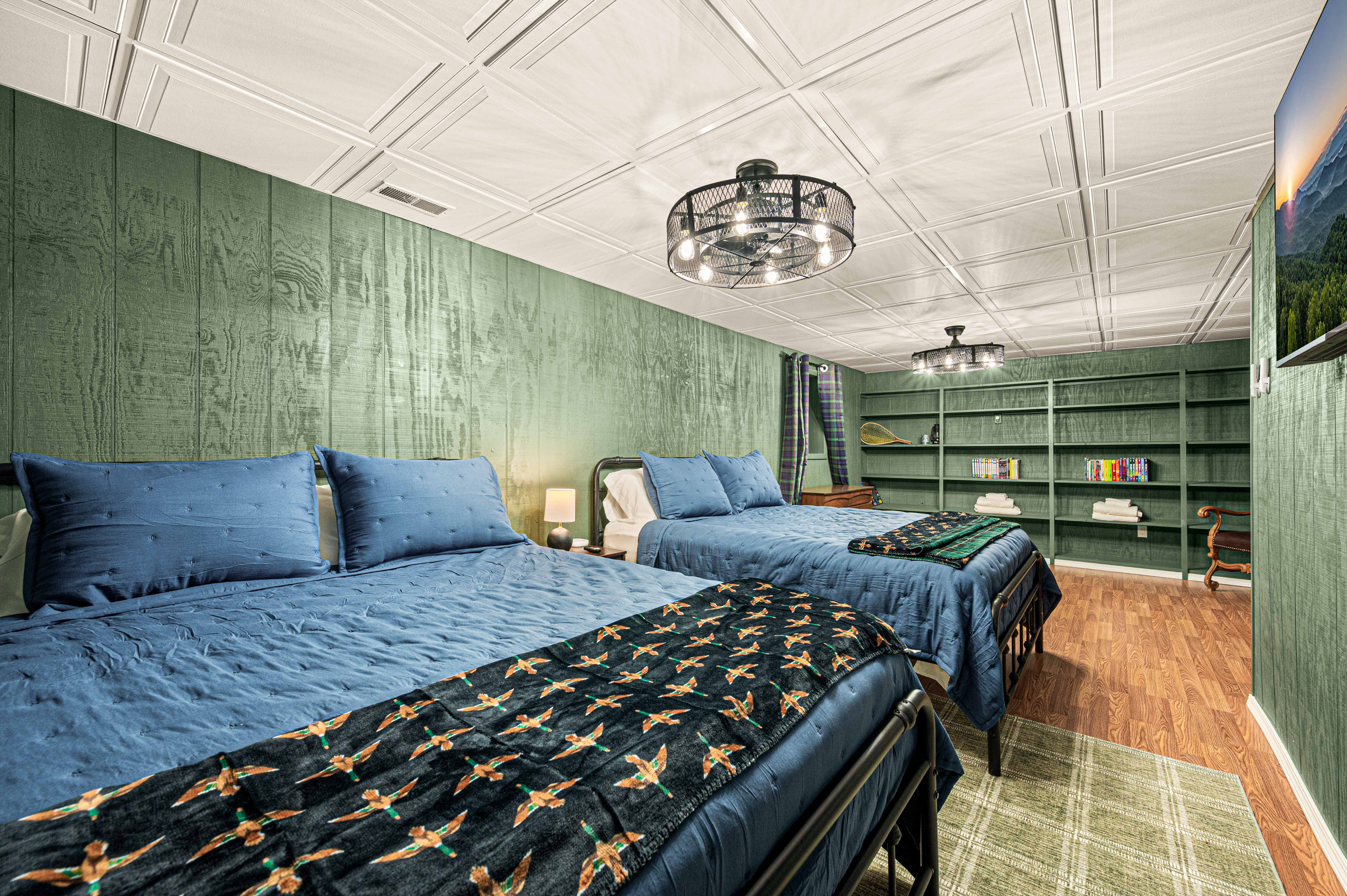 Guest Room Retreat: Twin beds and vibrant decor create the perfect escape after a day of adventure!