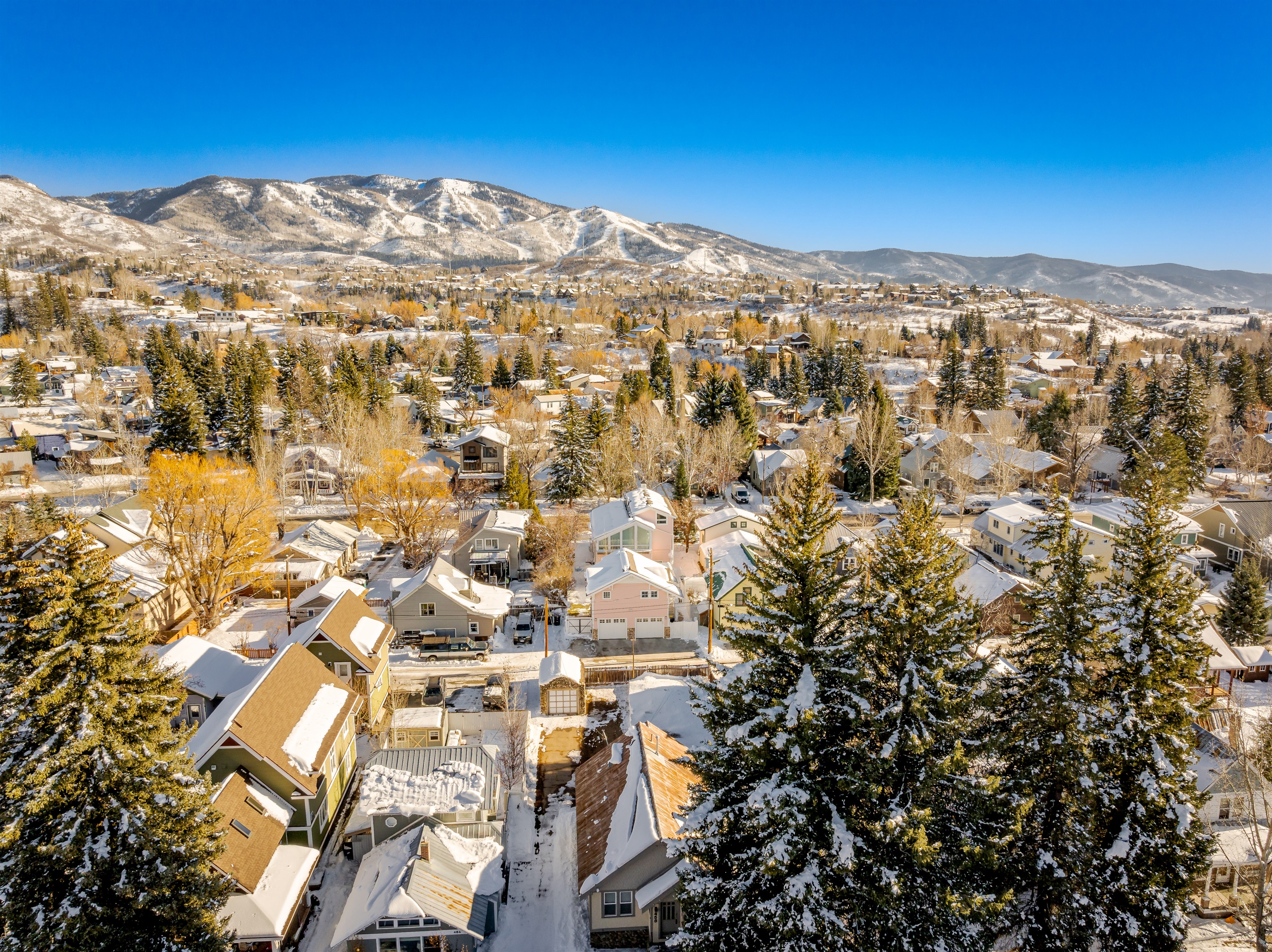 Aerial view of home with Ski Mountain in background