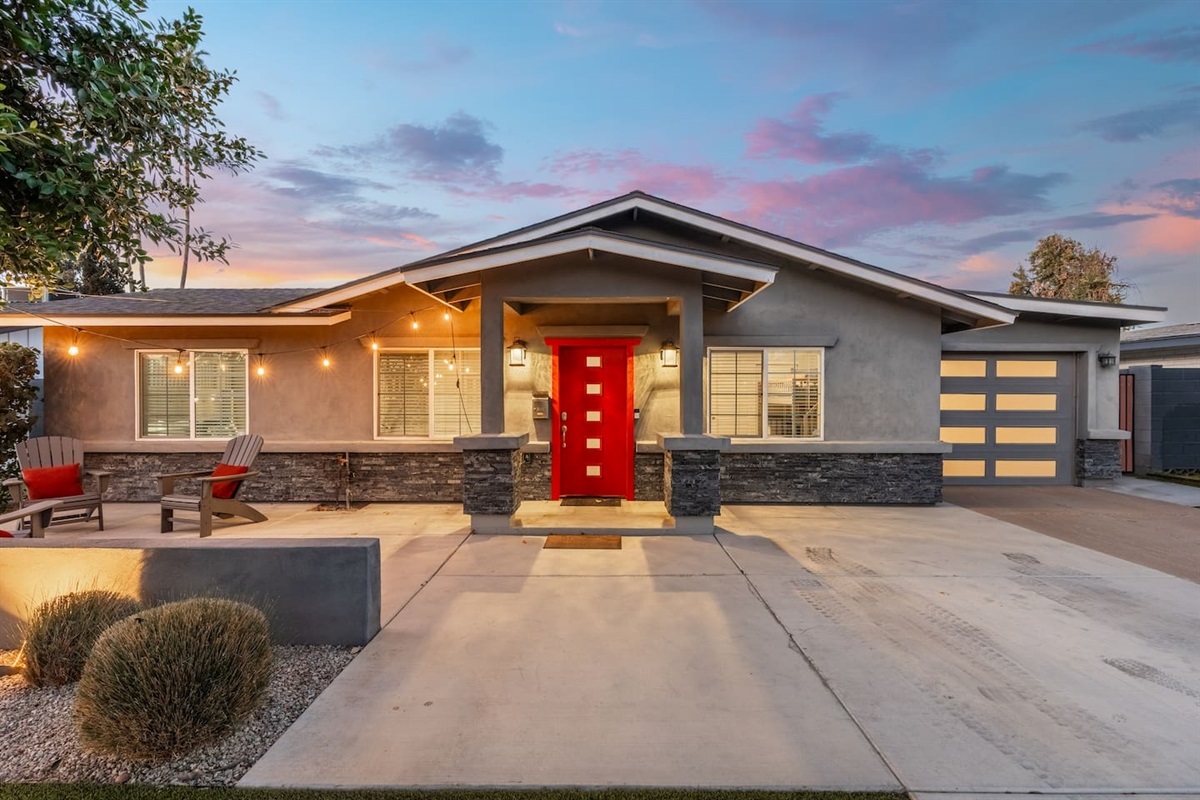 Spacious front yard, offering ample outdoor space for relaxation, gardening, or recreational activities.