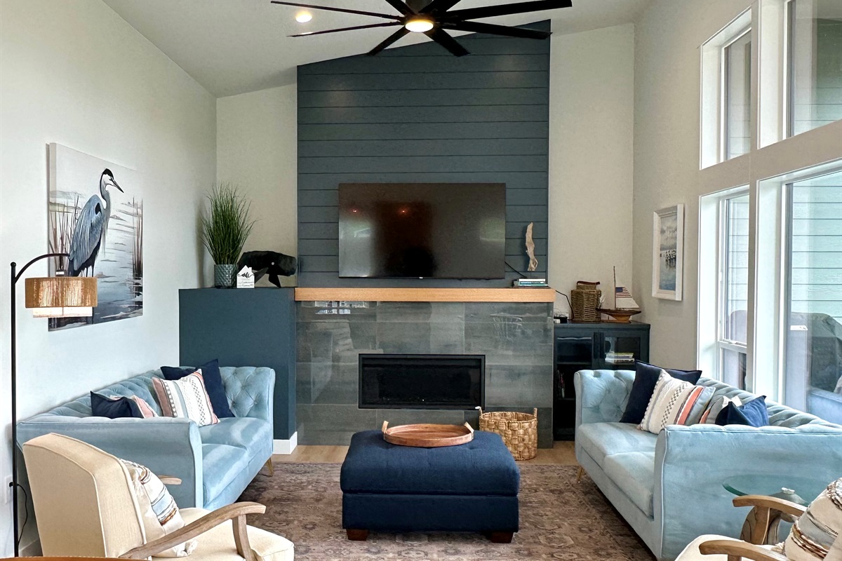 The Great Room in Villa A has soaring ceilings, natural light, and a space that feels as big as it looks.
