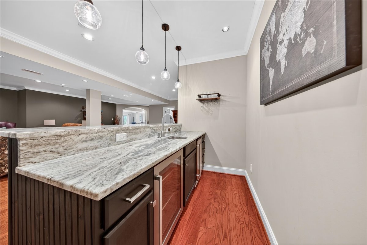 Basement wet bar perfect for drinks and snacks.
