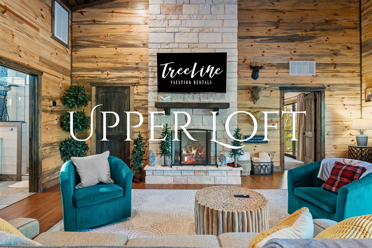 The spacious loft area is perfect for lounging with a book or enjoying a little quiet time above it all.