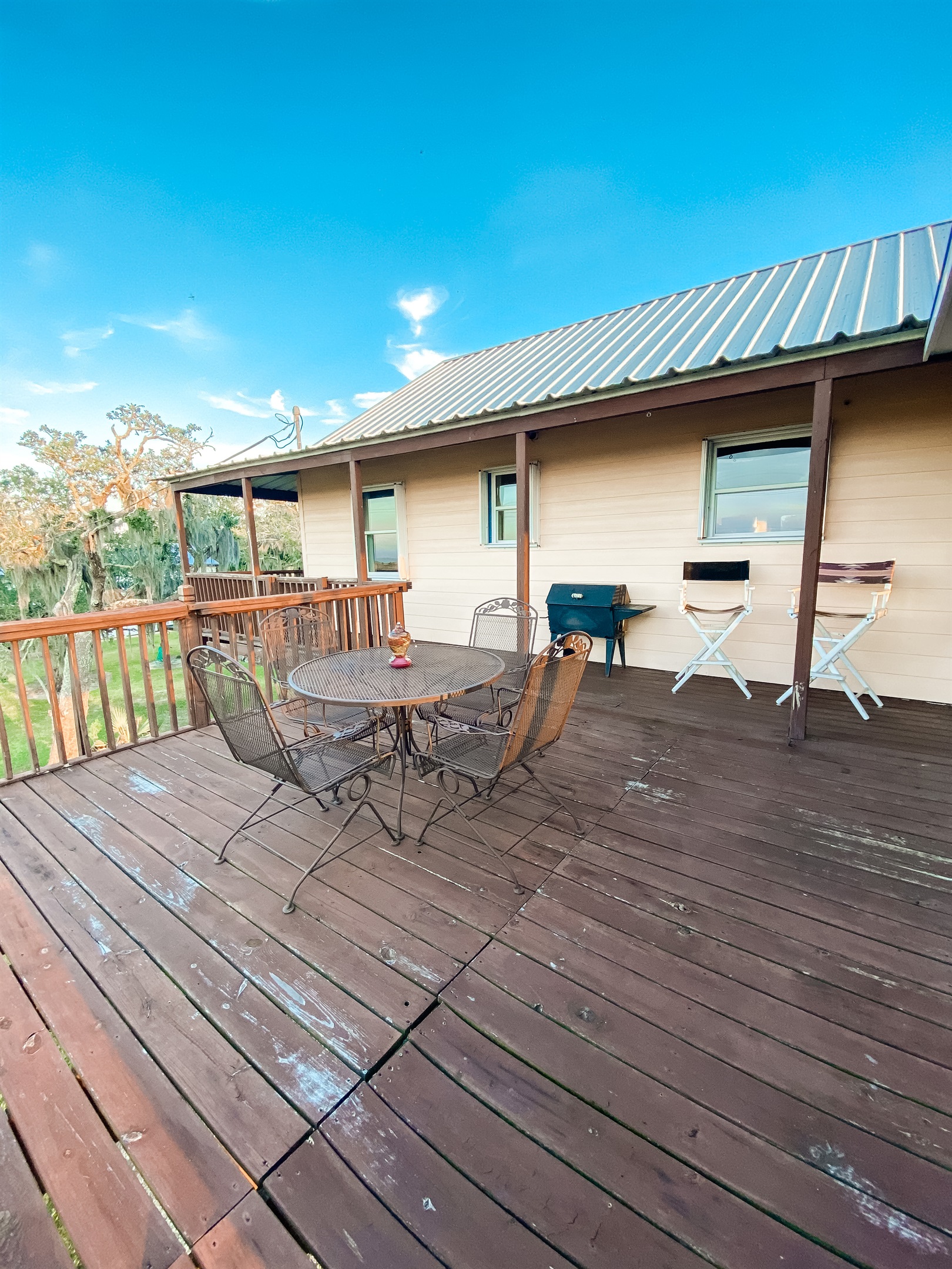 Enjoy a BBQ using the charcoal grill with utensils.