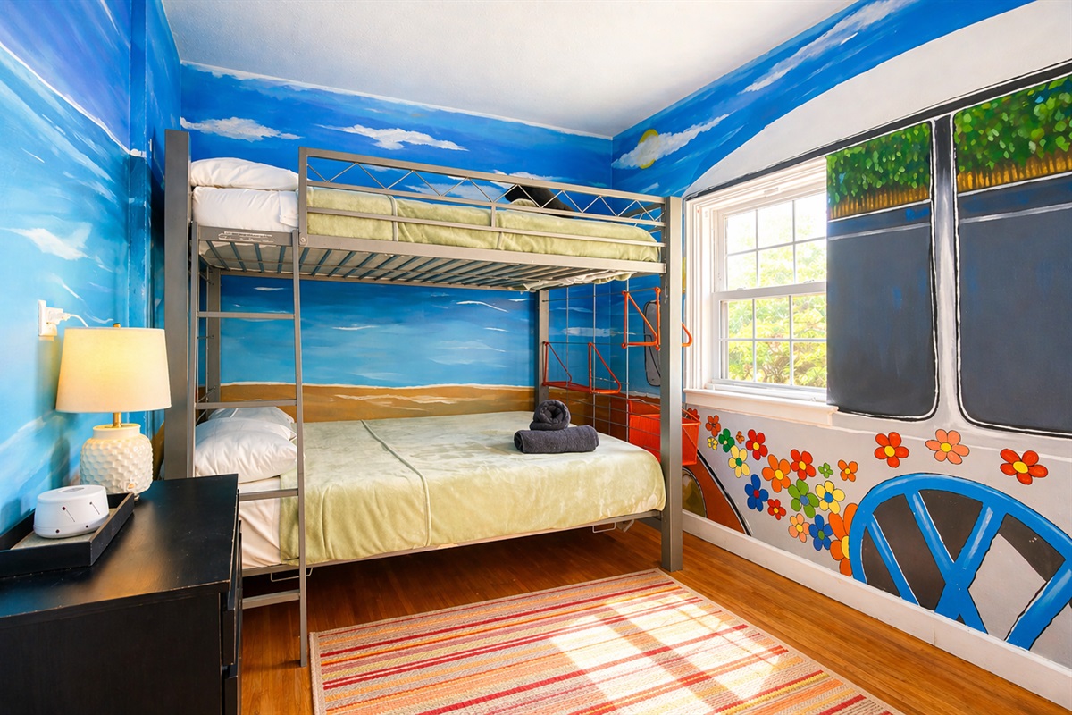 The 60s room: Two full-size bunk beds for up to 4 guests, sharing a bathroom with the 50s room.