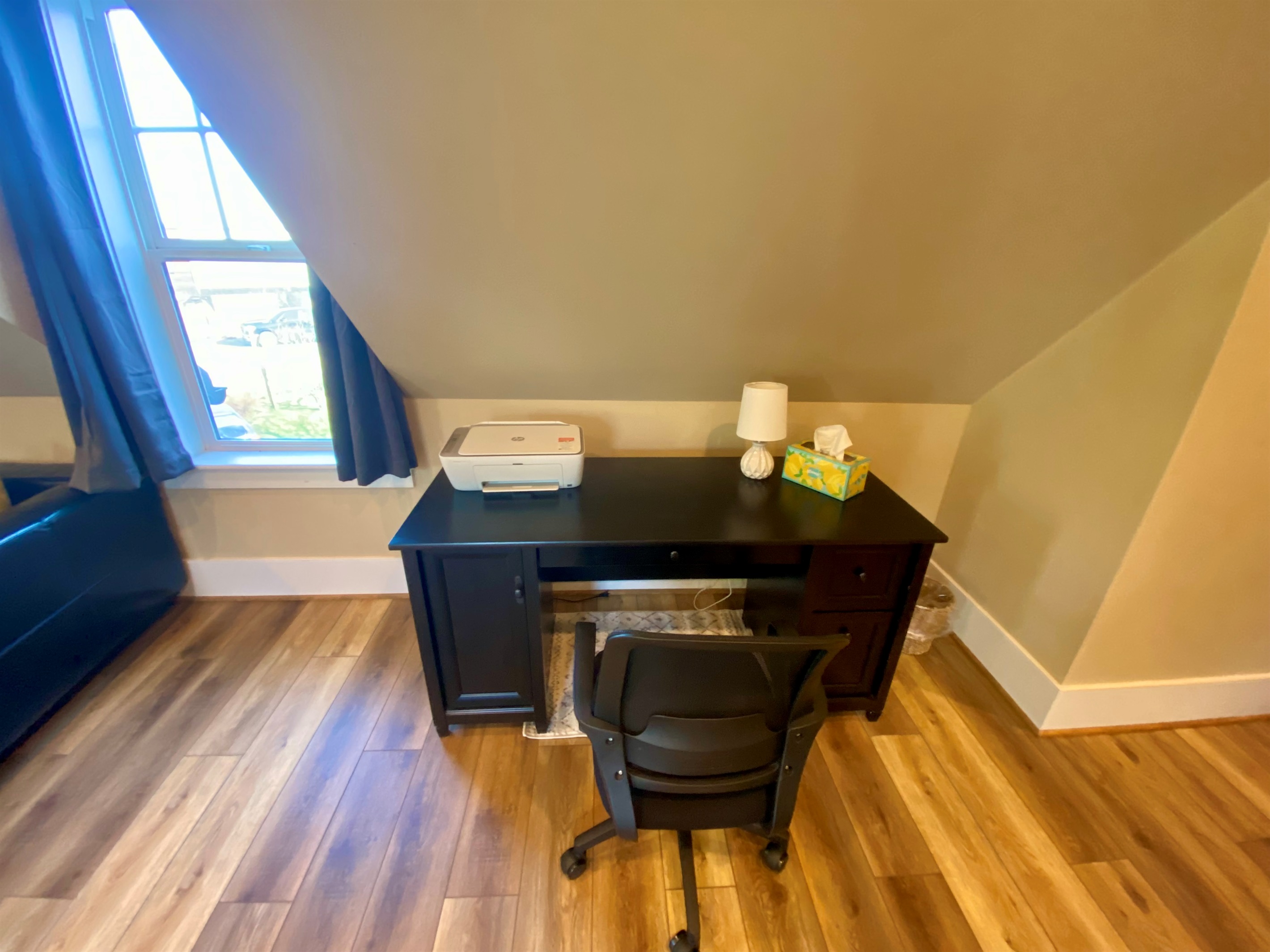 Couch, office desk with chair and printer in Bonus Room