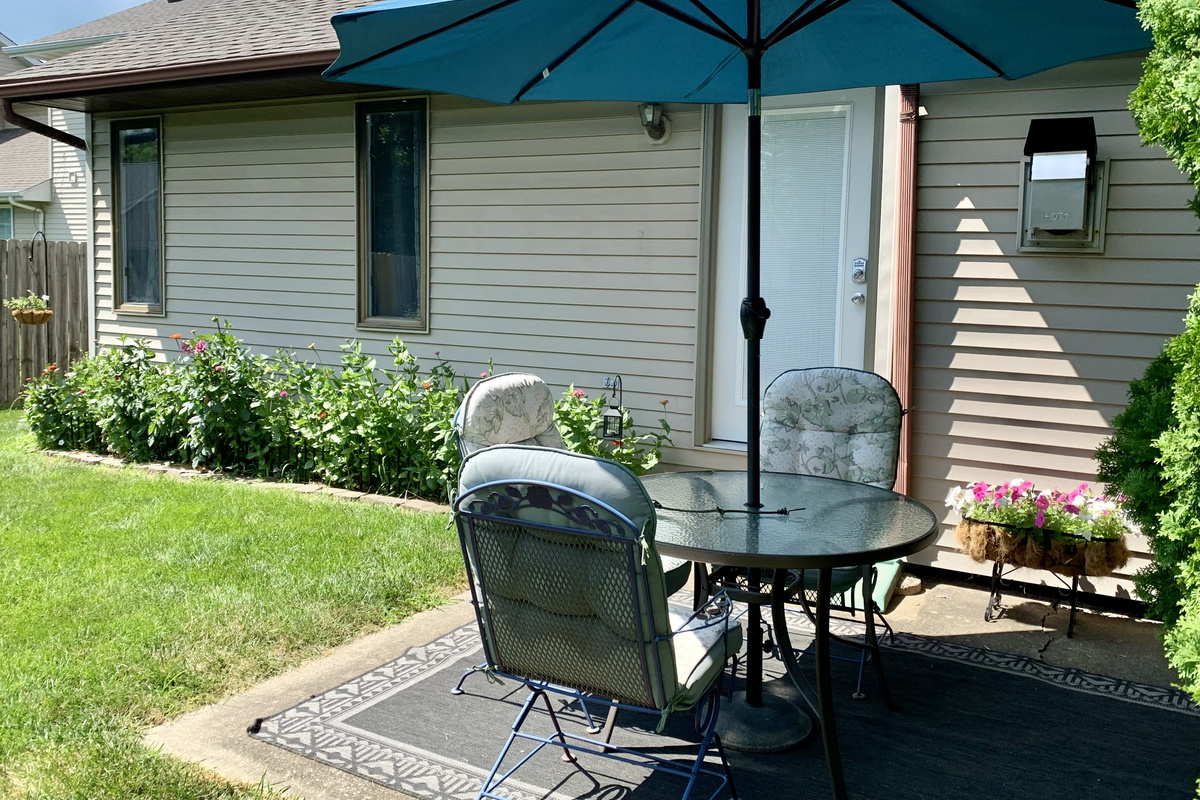 Enjoy morning coffee on the tranquil patio.