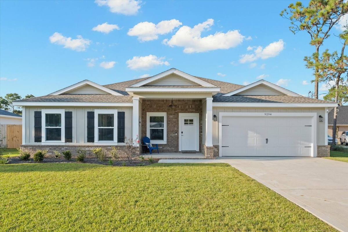 Super spacious NEWER home with HUGE fenced backyard!