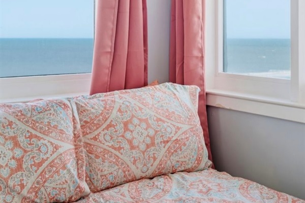 A quiet corner styled for connection — soft lighting, calming textures, and oceanfront views set the mood for slow evenings and easy conversation. Simple, intimate, and elevated. ⭐