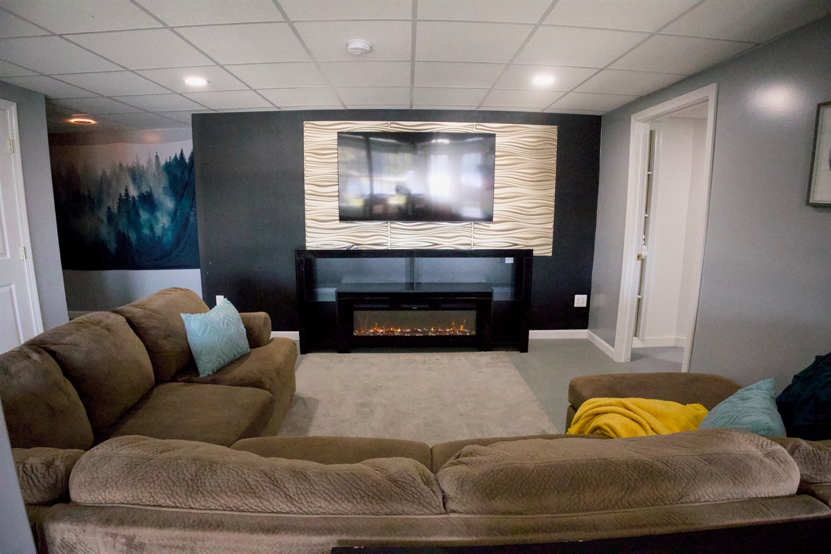A sectional and large tv. Makes good memories!