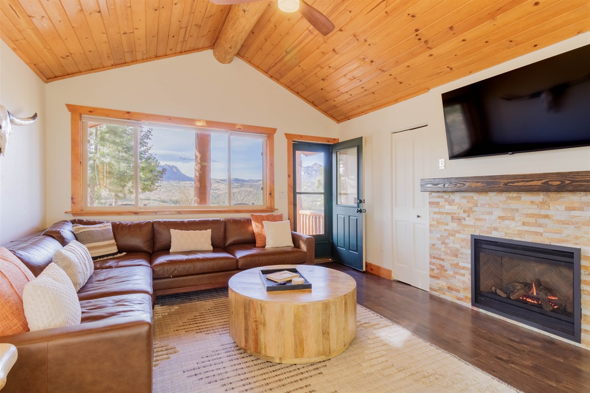 Spacious seating area with a beautiful new fireplace