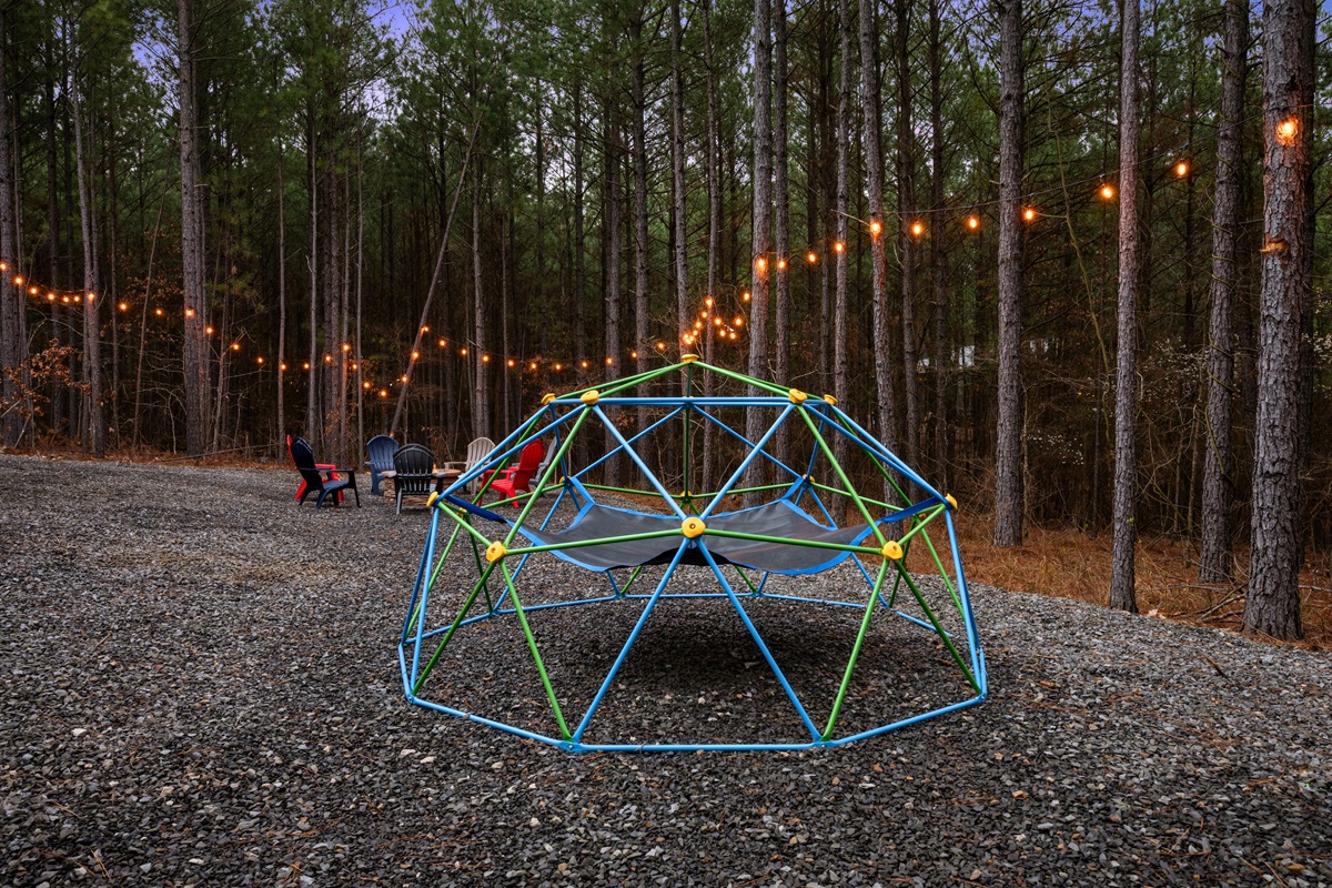 A colorful climbing dome adds an extra challenge for adventurous guests who want to climb, balance, and explore.
