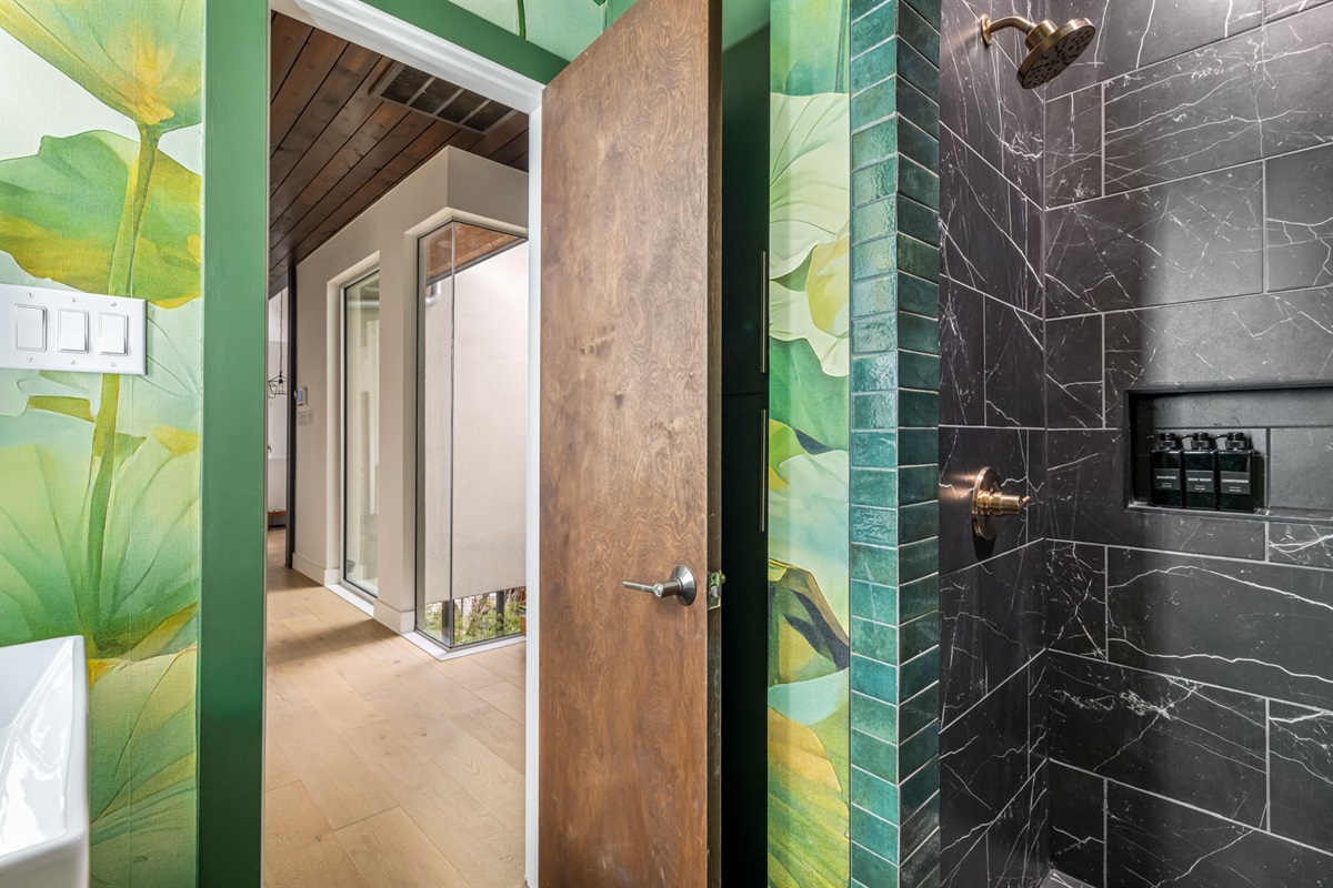 Contemporary bathroom with walk-in shower and custom tile finishes